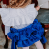 dettaglio gonna con fiocchi da bambina bluette in raso