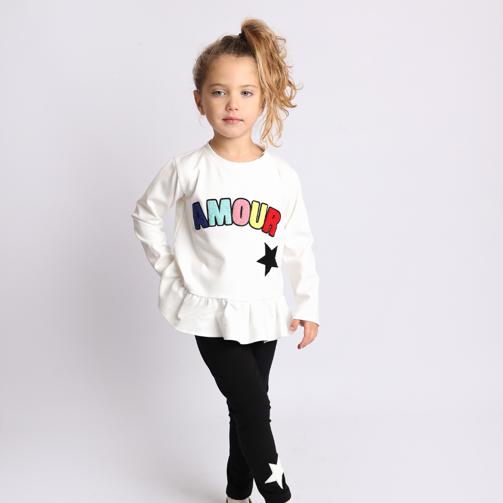 completo maglia e pantalone con scritta amore e stelle